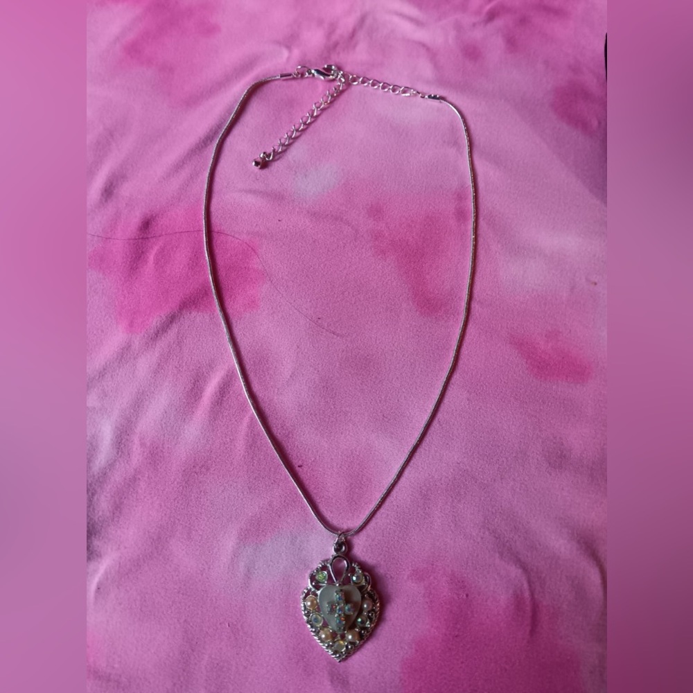 Silver heart necklace with tiny cross